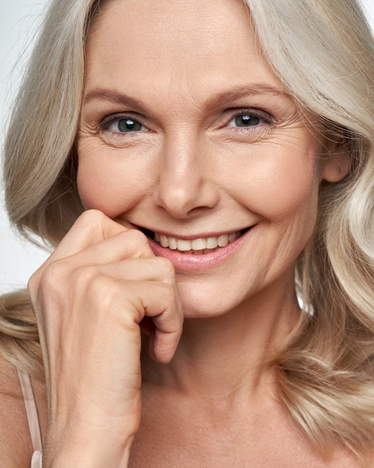 Smiling older woman with great skin