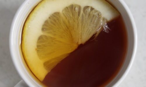 Photo of a lemon slice in tea