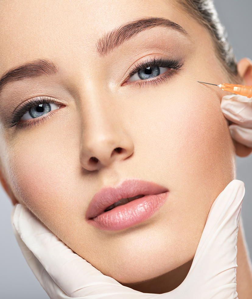 Photo of a woman receiving a BOTOX® Cosmetic treatment