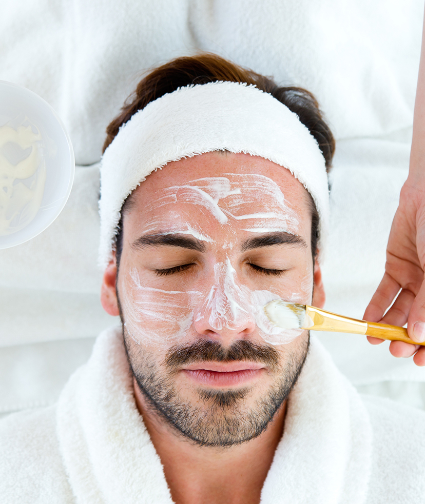 Photo of a man getting a facial treatment