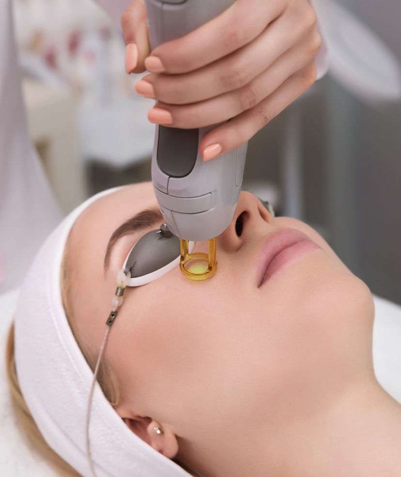 Photo of a woman receiving a fractional laser treatment