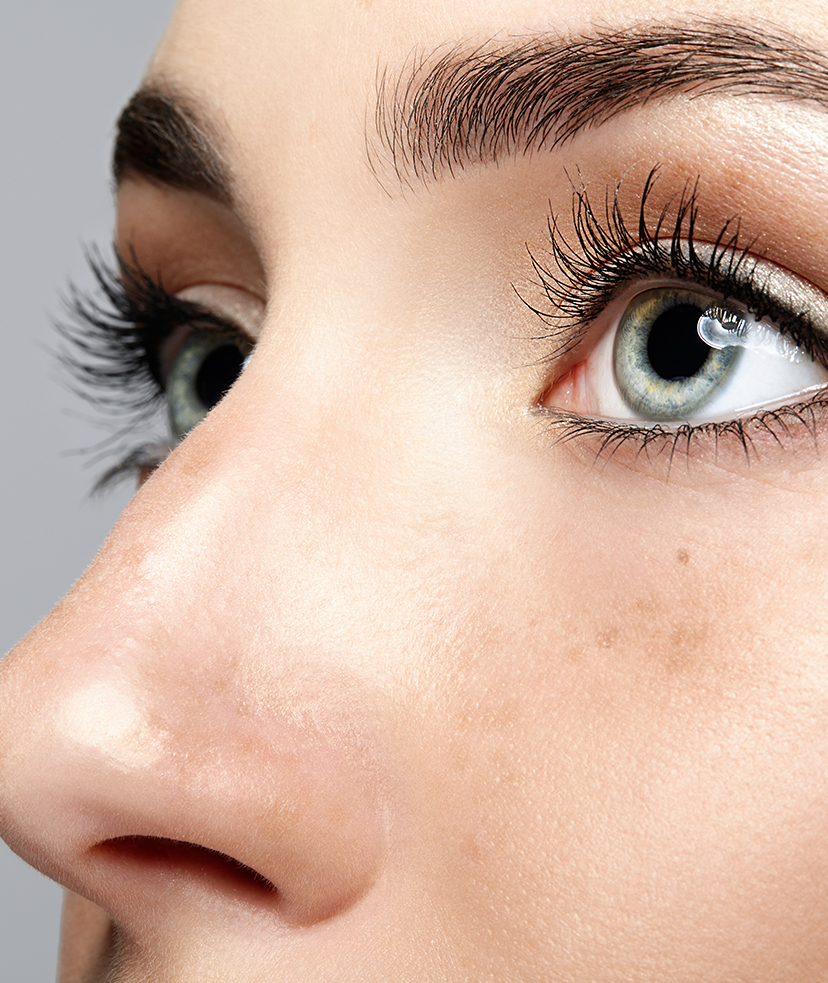 Photo of a woman's green eyes and lashes